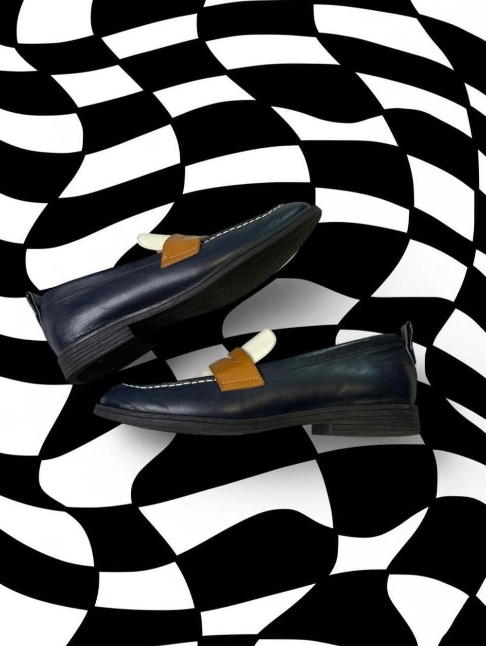Cole Haan Navy blue leather loafers with tan and cream accents